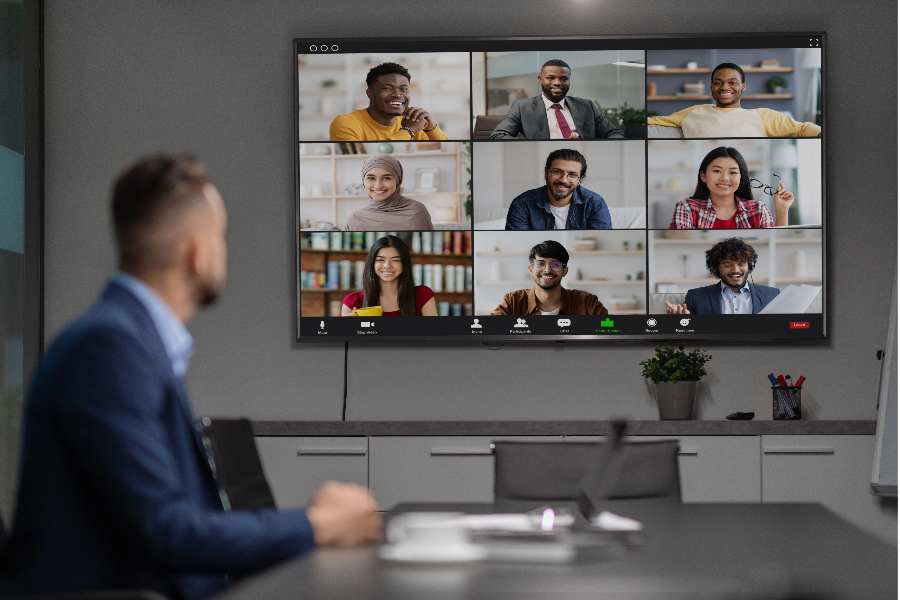 Man participating in an exchange from a conference room