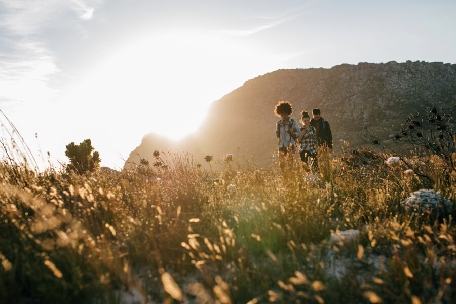 People hiking together through a valley
